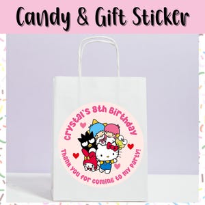 May include: White paper gift bag with a circular sticker featuring cartoon characters and the text "Crystal's 8th Birthday". The sticker includes hearts and the phrase "Thank you for coming to my party!" in pink.