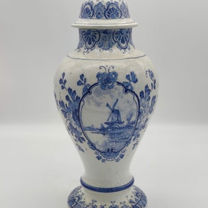 Antique Blue Delft lidded vase featuring a windmill