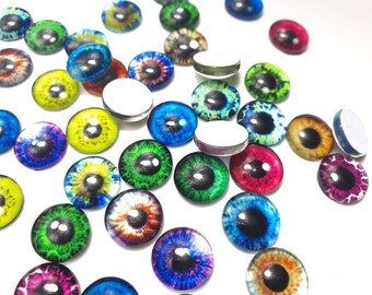 12 mm x 50 piezas Ojos Cabujones de vidrio Ojos de animales Ojos humanos Ojos de muñecas FLAT-BACK para la fabricación de joyas