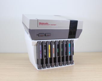 Soporte de exhibición de cartuchos y consola de juegos NES