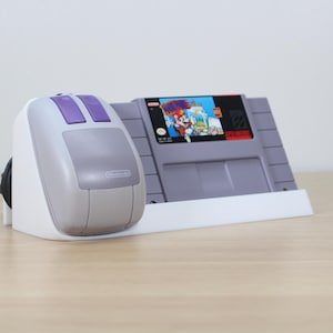 Présentoir pour souris et cartouches de jeu Super Nintendo
