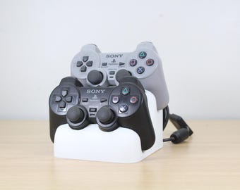 Soporte para dos mandos PS1/PS2: Pantalla impresa en 3D con enrollador de cable