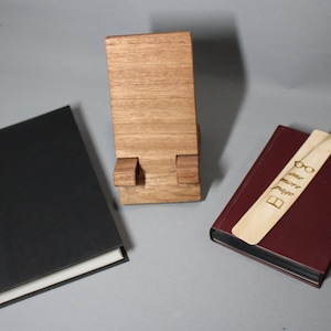 Book/Kindle Stand Mahogany with Cedar Book Marker - When your eyes need a rest your book can rest. Package incudes (1) stand and (1) marker.