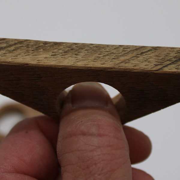 Barnwood Thumb Page Holder - Reclaimed Red Oak with 1" thumb opening.  This is a perfect match for reading those old rare books!