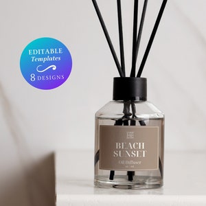May include: A clear glass bottle with a black lid and black diffuser sticks. The bottle has a label that says "your logo here" and "BEACH SUNSET Oil Diffuser".