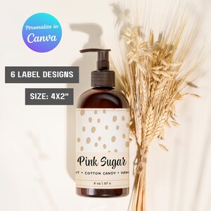 May include: A brown bottle with a pump dispenser and a white label with brown polka dots. The label reads "Pink Sugar" and "IT + COTTON CANDY + VANILLA". The bottle contains 8 ounces (227 grams) of liquid.