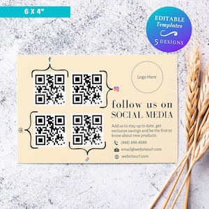 以下が含まれることがあります： クリーム色の背景を持つ6x4インチのビジネスカードテンプレート。カードには4つのQRコード、ロゴのプレースホルダー、および「follow us on SOCIAL MEDIA」というテキストが記載されています。カードには、電話番号、メールアドレス、ウェブサイトURLなどの連絡先情報も含まれています。