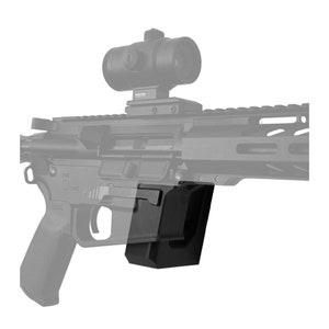 May include: A black AR-15 style rifle with a red dot sight attached to the top rail. The rifle has a black polymer lower receiver and a black metal upper receiver. The rifle is equipped with a black polymer pistol grip and a black polymer stock. The rifle is also equipped with a black metal magazine.