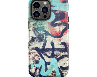 May include: A smartphone case with a graffiti-style design. The case features a mix of colors, including blue, red, and black, with a white background. The design has a distressed, urban art aesthetic.
