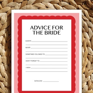 May include: A white card with a red border and pink inner border. The card has the text "Advice for the Bride" and includes lines for writing advice for a bride.