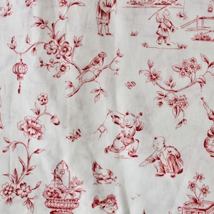 May include: White fabric with a repeating pattern in red. The pattern features illustrations of people, birds, flowers, and lanterns. The fabric has a toile de Jouy style.