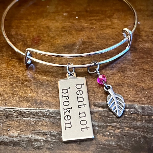 Stainless Steel Bangle Bracelet 3” diameter, stainless steel  1.5” charm with  “bent not broken” laser engraved.     perfect, unique gift