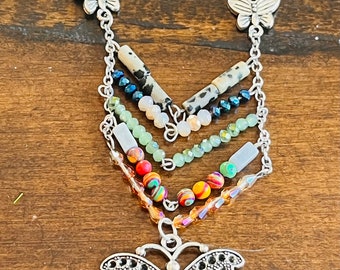 30” necklace with 2” drop charm of butterfly and beads, handcrafted