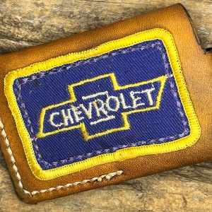 Cartera con bolsillo delantero Chevrolet