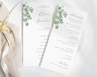 May include: Wedding ceremony program with eucalyptus greenery and calligraphy font. The program includes the names of the bride and groom, the wedding date, the location, and the order of events. The wedding party is listed on the back of the program.