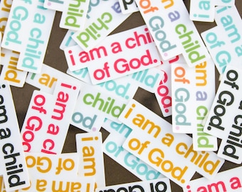 May include: A collection of colorful stickers with the phrase "I am a child of God." repeated on each sticker. The stickers are printed on white paper with black lettering.