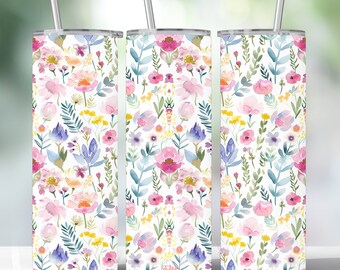 May include: Three stainless steel tumblers with a floral pattern. The tumblers are white with a pink, blue, and yellow floral design. The tumblers are all the same size and have a straw.