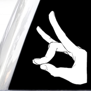 May include: A high-contrast graphic illustration featuring a stark white silhouette of a hand forming a specific gesture against a solid black background. The design includes a clean, sharp outline and a smooth, minimalist aesthetic with no shading.