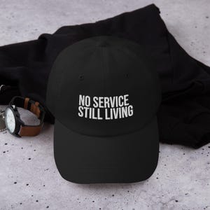 No Service Still Living Hat – Embroidered Off-Grid Adventure Dad Hat, Unisex Cotton Camping Cap, Nature Lover’s Hat with Free Shipping