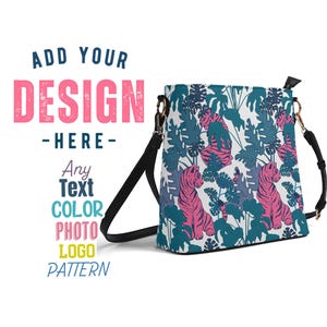 May include: A black and white shoulder bag with a colourful pattern of pink tigers and blue leaves. The bag has a black strap and a gold buckle.