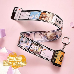 May include: A black and white film strip keychain with a calendar, photos, and the text "I love you" and "Cindy, you are my sunshine". The keychain is attached to a 35mm film canister with the text "400 36exp. 35mm color print film 400 DON K40036".