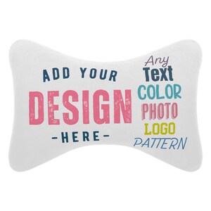 Puede incluir: Una almohada blanca en forma de hueso con el texto "ADD YOUR DESIGN - HERE-". El texto adicional incluye "Any Text COLOR PHOTO LOGO PATTERN" en varios colores. La almohada est&aacute; dise&ntilde;ada para la personalizaci&oacute;n.