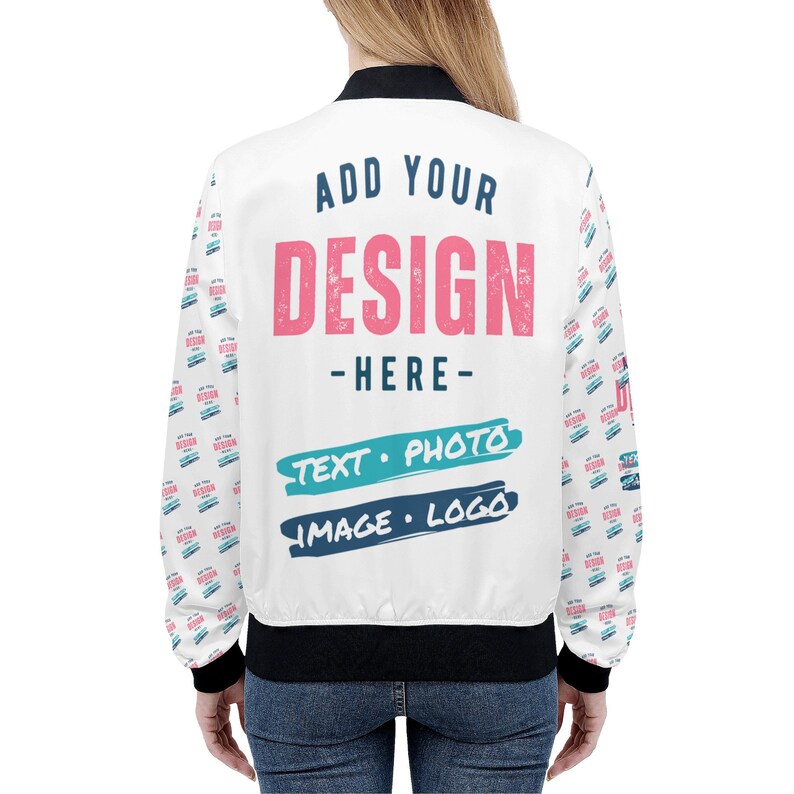 May include: White bomber jacket with a black collar and cuffs. The back of the jacket has the text "ADD YOUR DESIGN - HERE - TEXT. PHOTO IMAGE. LOGO" printed in blue and pink.