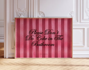 May include: A pink and white striped poster with the text "Please Don't Do Coke in The Bathroom" in black cursive font.