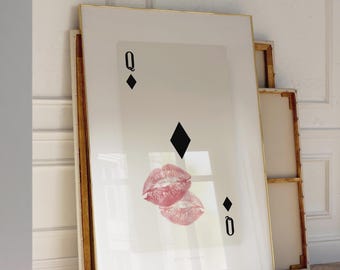 May include: A rectangular wall art print featuring a stylized Queen of Diamonds playing card design. The card has a white background with black diamond symbols and the letter Q in the corners. A pink lipstick kiss mark is centered on the card.