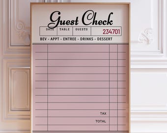 May include: A framed print of a restaurant guest check. The top section features the words "Guest Check" in elegant script, along with fields for date, table, guests, and a check number. The main body has lines for itemizing orders, with sections for tax and total.