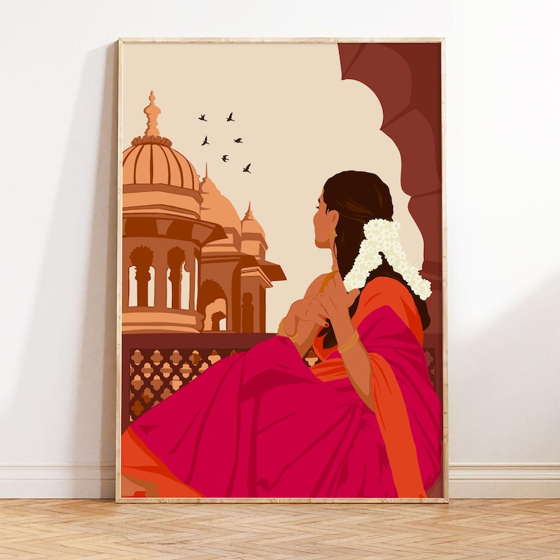 May include: A woman in a pink and orange sari sits on a balcony overlooking a brown building with multiple domes. She is looking out at the cityscape, and there are birds flying in the sky.