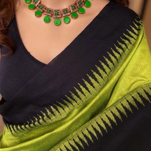 black and parrot green saree
