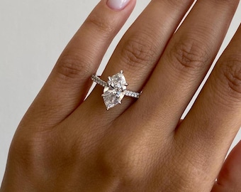 3.50 carat E Color VVS2 Clarity IGI Certified Marquise Cut / Lab Grown Diamond Cathedral Engagement Ring with side diamonds and hidden halo