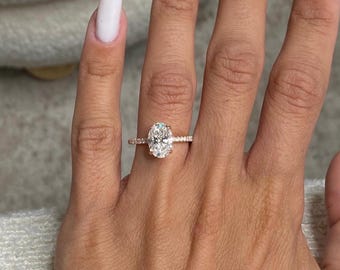 Exquisite 2.85 Carat Oval Cut Lab-Grown Diamond Engagement Ring with Hidden Halo & Pavé Accents in 18K Rose Gold | IGI Certified E-VVS2 |
