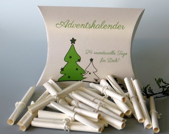 May include: A white pillow-shaped box with a green and white Christmas tree design. The box says "Adventskalender" and "24 wundervolle Tage fur Dich!"  The box is filled with 24 small white rolled-up papers tied with string.