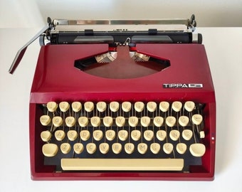 ADLER TIPPA red typewriter