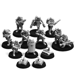 May include: A selection of miniature figurines depicting soldiers in futuristic armour, each on a black circular base. Some figures are armed with rifles, while others have heavy weapons or shields. Several small tank-like vehicles are also present.