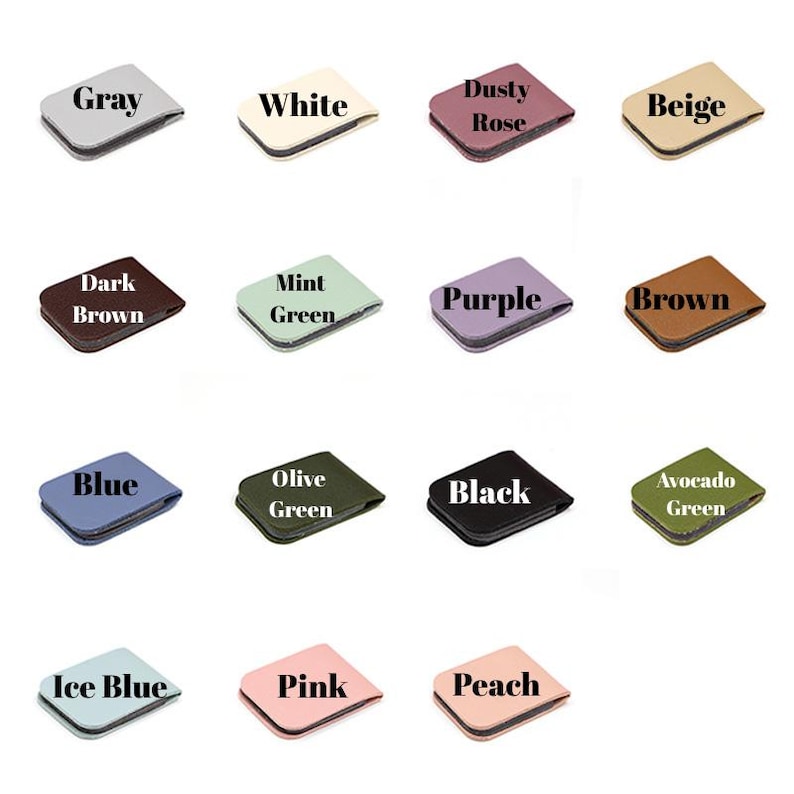 May include: A collection of small, rectangular, leather-like wallets in various colors, including gray, white, dusty rose, beige, dark brown, mint green, purple, brown, blue, olive green, black, avocado green, ice blue, pink, and peach. Each wallet has a contrasting border and a label indicating its color.