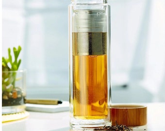 Bottiglia thermos in vetro con coperchio in bambù da 550 ml.