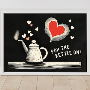 May include: A framed art print featuring a black background with a white teapot design. The teapot is releasing steam and surrounded by heart shapes. The text "POP THE KETTLE ON!" is written below the teapot.