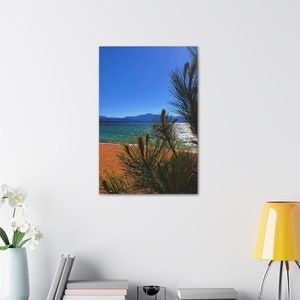 Canvas print nature wall art of Lake Tahoe as seen through a pine tree