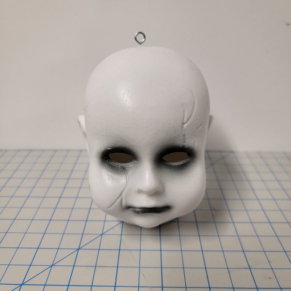 Color Changing Creepy Doll Heads for Halloween