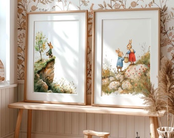 May include: Two framed watercolor illustrations of bunnies in a woodland setting. The first illustration shows a bunny standing on a cliff with a tree behind it. The second illustration shows two bunnies walking on a path with rocks and flowers.