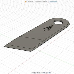 May include: A gray, stylized metal tool with a blade-like edge and a rounded hole at the top. The letter "A" is etched into the surface. The tool is designed with a beveled edge.