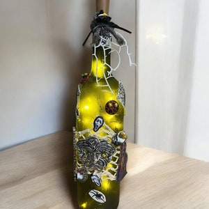 Gothic/halloween   lighted wine bottle featuring creepy  characters, Halloween  bottle art, scary lit decorated wine bottles, Etsy