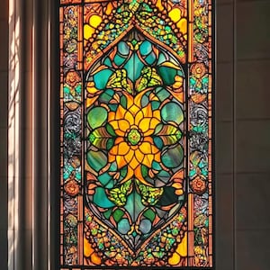 May include: A stained glass window with a colorful floral design. The center of the window features a large yellow flower with orange and red accents. The surrounding design features green, blue, and purple leaves and vines.