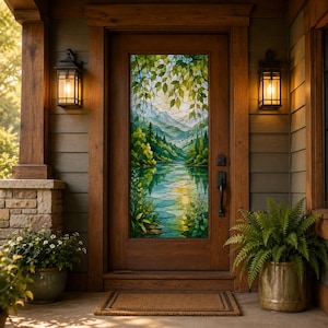 May include: A wooden front door featuring a stained glass panel depicting a serene mountain lake landscape with green trees and foliage. The door is flanked by two black metal wall lanterns and sits on a porch with potted plants on either side.
