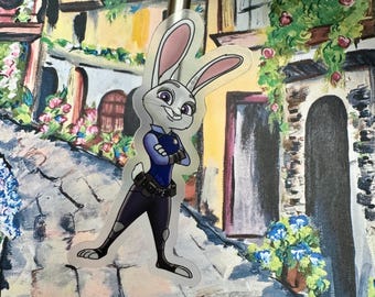 May include: A clear sticker featuring a cartoon rabbit wearing a blue police uniform with a white shirt and a black belt. The rabbit has white fur, pink ears, and blue eyes. The rabbit is standing with its arms crossed and looking to the right.