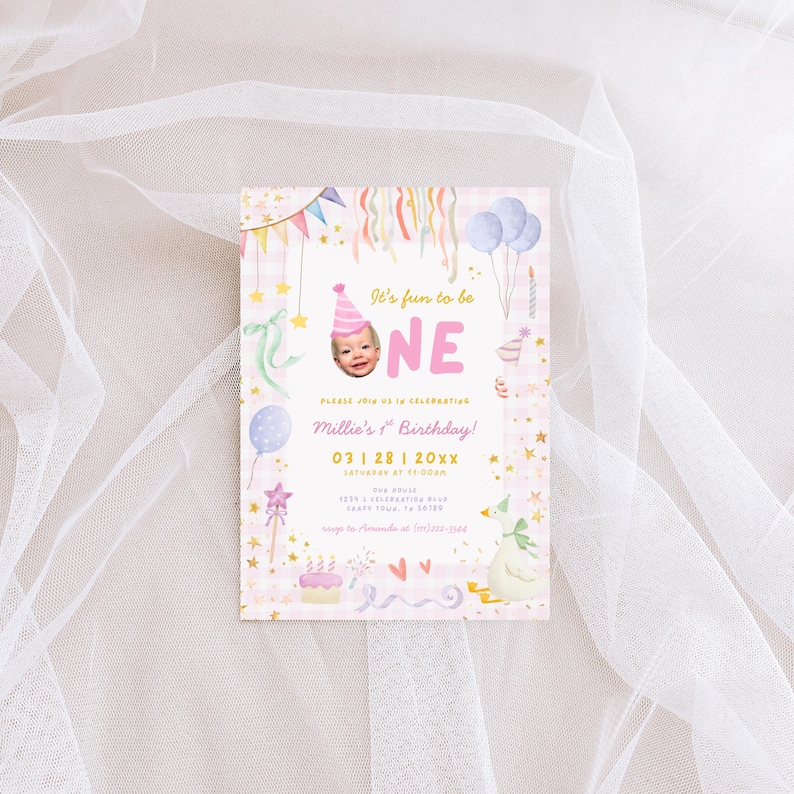 May include: A pink and white birthday invitation with the text "It's fun to be ONE" and a photo of a baby wearing a party hat. The invitation includes the date, time, and location of the party, along with decorative elements like balloons and stars.