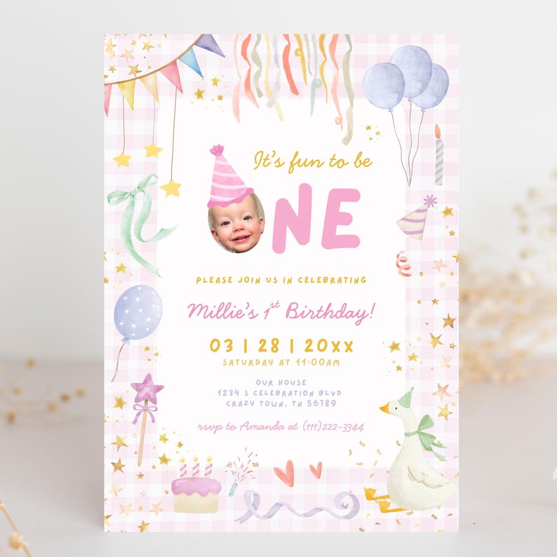 May include: A pink and white birthday invitation with the text "It's fun to be ONE". The invitation includes a photo of a baby, balloons, a cake, and a goose. The invitation is for Millie's 1st birthday.